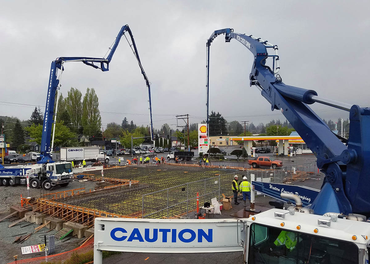 Pouring concrete foundation at Craft Stove, Chad Fisher Construction